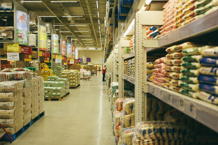 The aisles of a retail warehouse distribution center